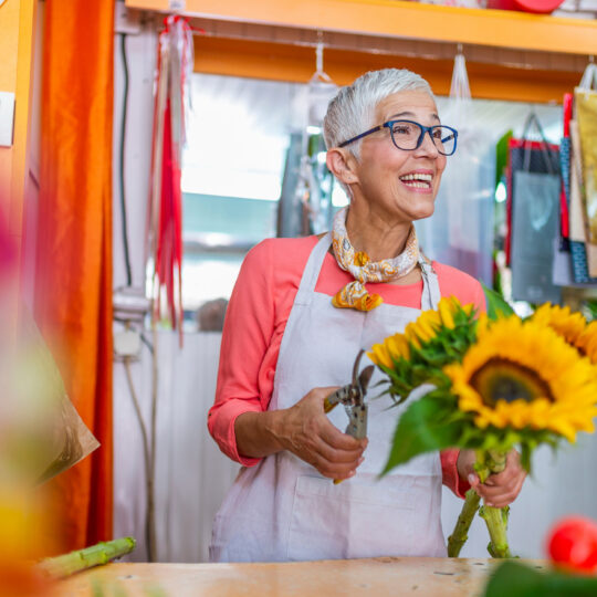 Photo of woman with flowers.